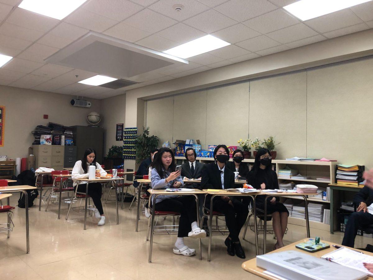 Mock Trial: Prosecution team prepares for first scrimmage round.