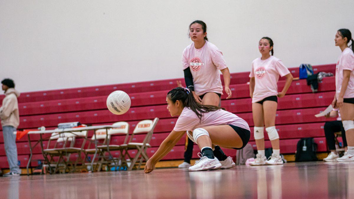 Girls Varsity Volleyball Secures Victory During Dig Pink Game