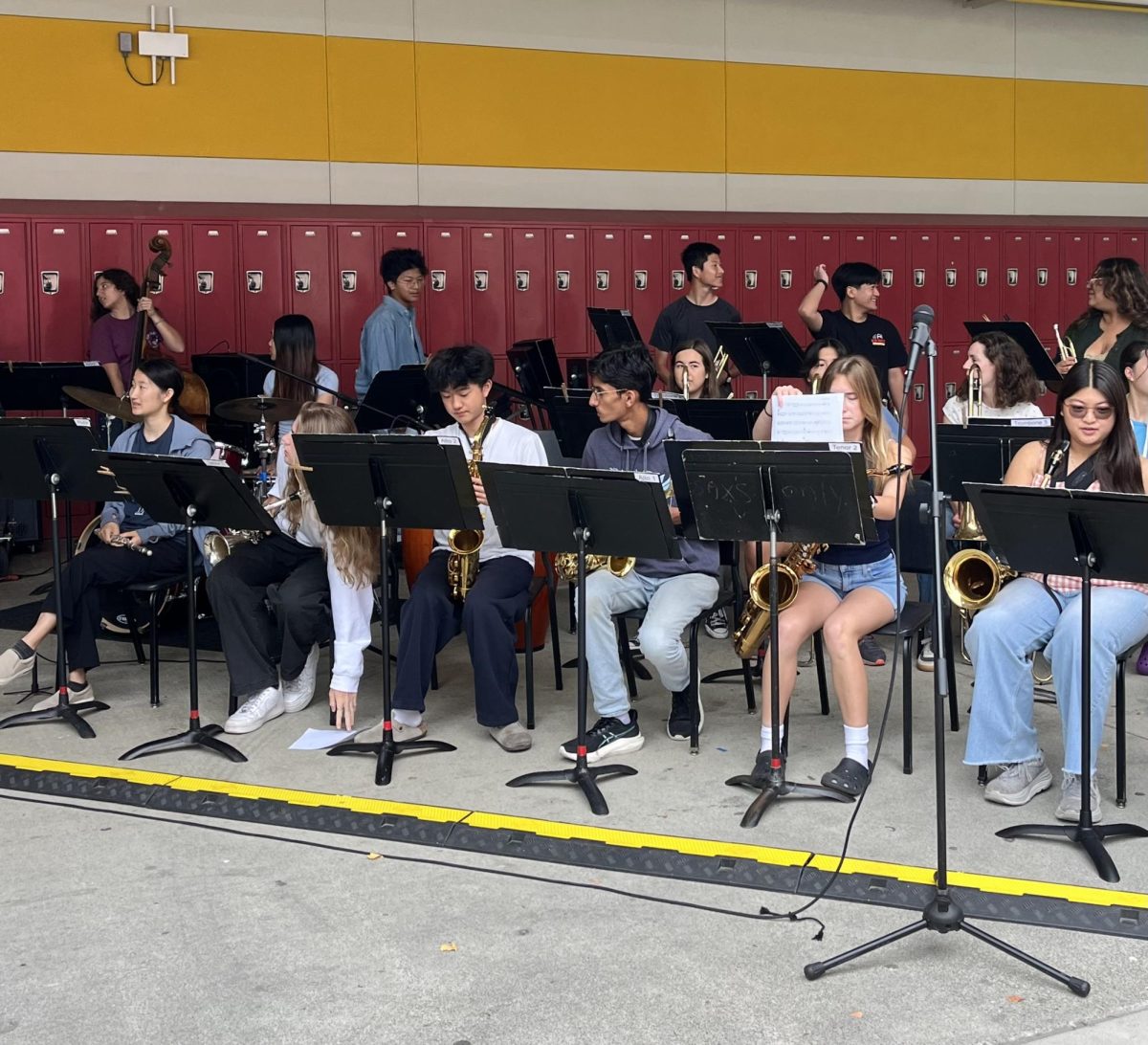 BROWN BAG SHOW PREPARATION: Mills jazz band members set up for the lunch performance on Sept. 18, 2025