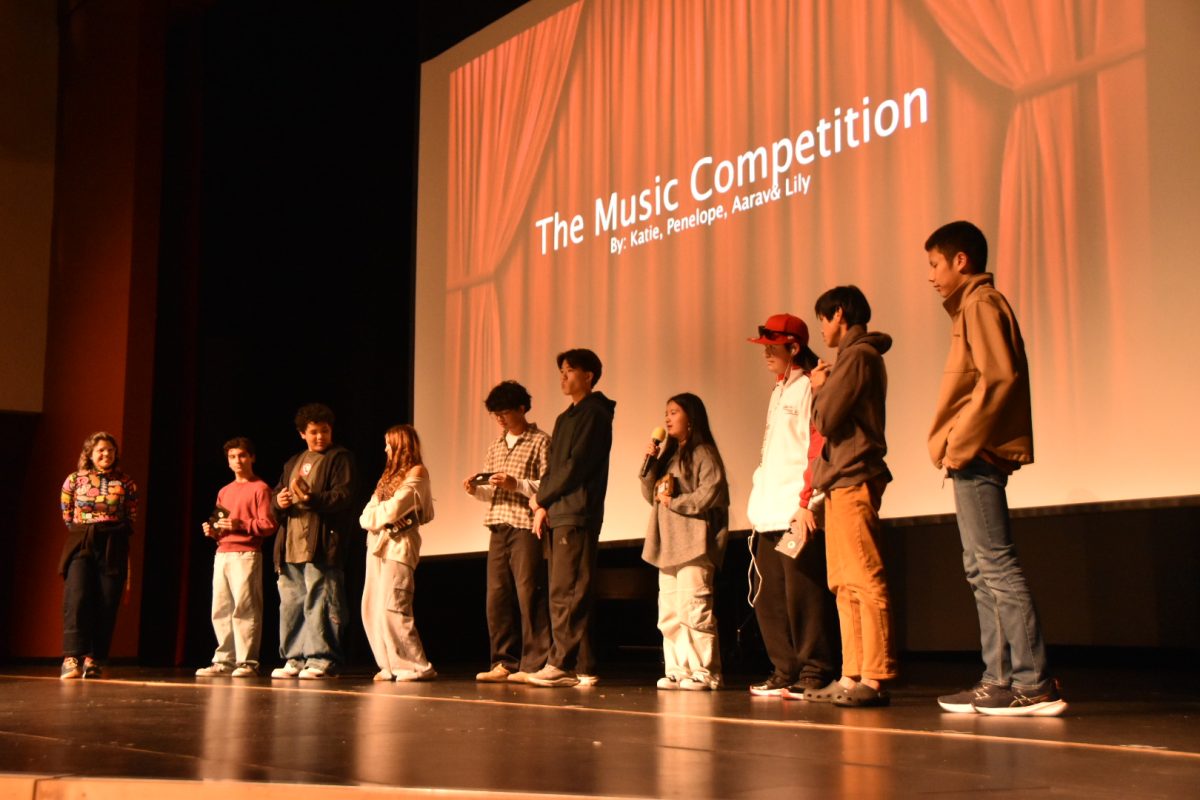 Filmmakers line up to receive their award for their winning films. 