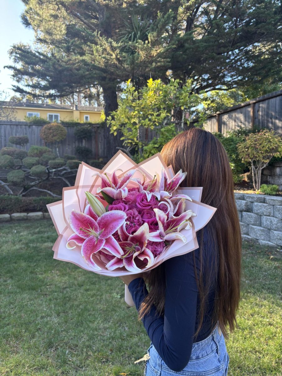 Senior Brooke Phimsoutham arranges custom bouquets, each created with love and care.
