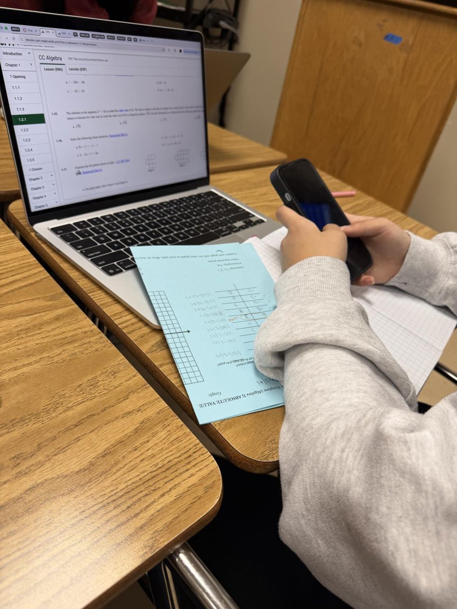 Like many students, they get distracted by their phones while working. 