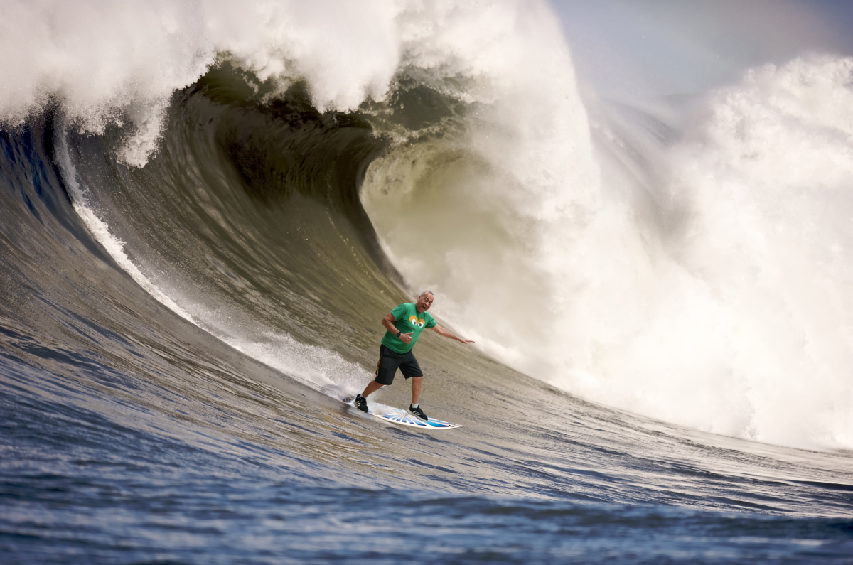 Wave Riding: Donald Burdette surfing through the ocean and having fun 
