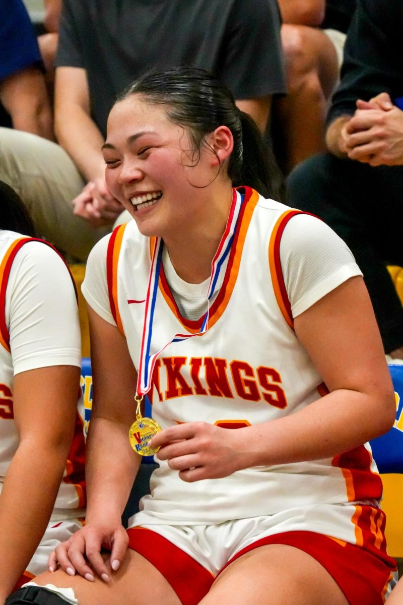 Layla Wong in all smiles after receiving her medal 