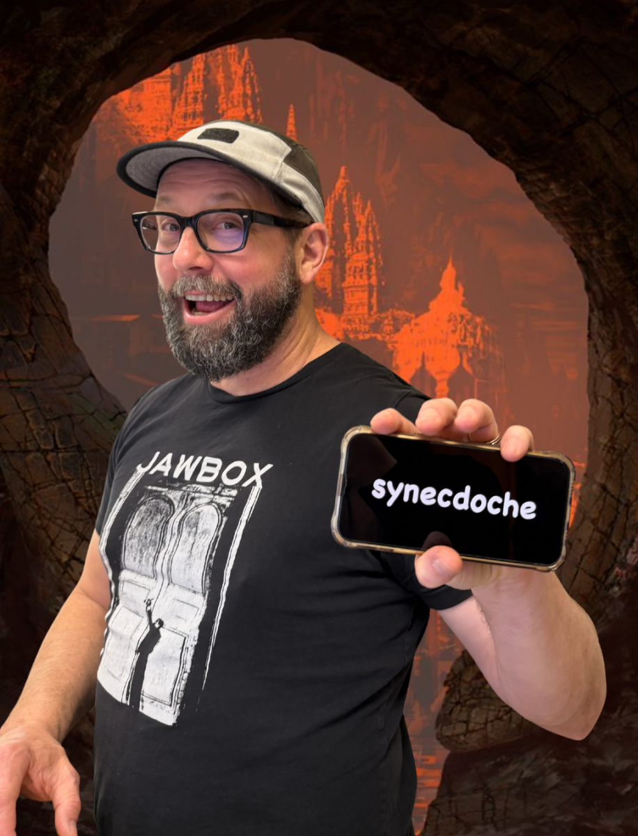 English teacher Anthony Pretto proudly holds up the rarest literary device he found, ‘synecdoche,’ after one of his walks in the subterranean pathway.